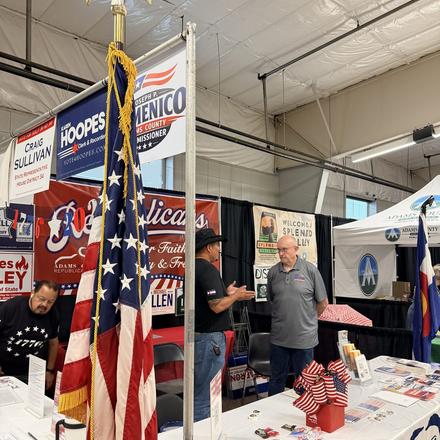 The Craig Sullivan for House District 34 sign above the county party booth