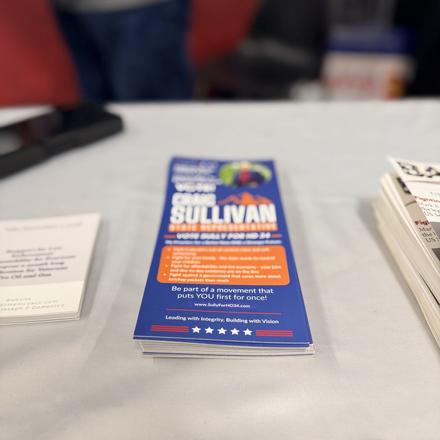 A Craig Sullivan campaign brochure on the booth table