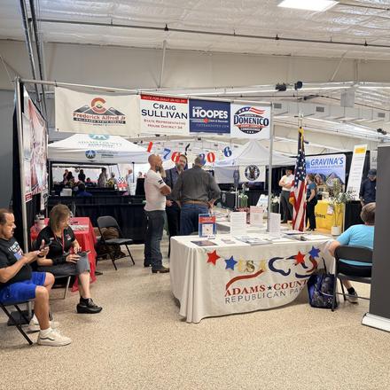 Looking down the aisle toward the county party booth