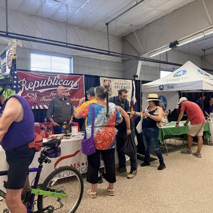 The aisle crowded outside the county party booth