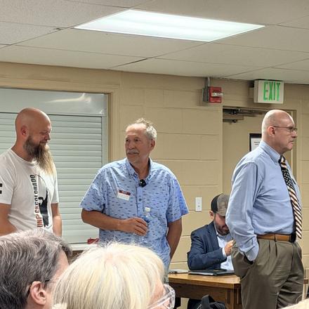 Craig Sullivan standing with other candidates as they are introduced