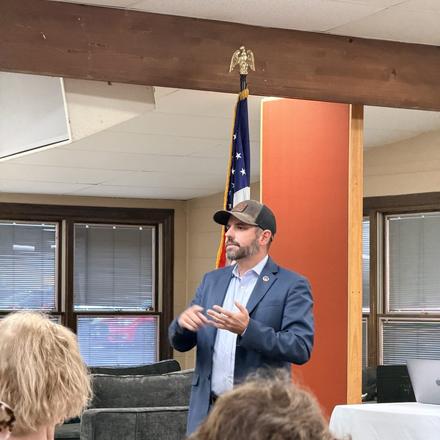 A candidate addressing the county party meeting