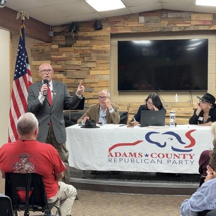 Craig Sullivan making a point at the microphone