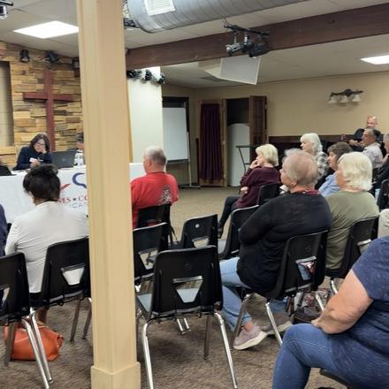 Members seated for the September county party meeting