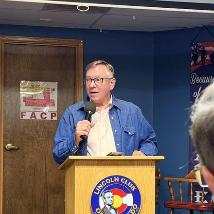 A speaker at the Lincoln Club of Colorado lectern