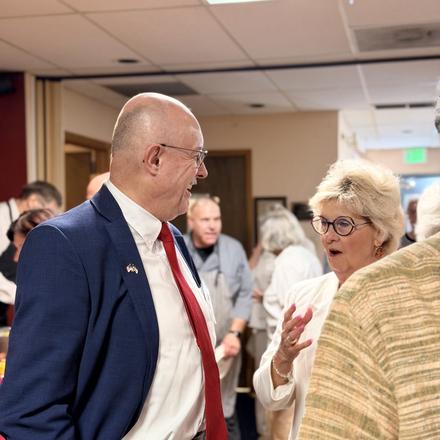 Craig Sullivan in conversation with a guest at the Lincoln Club